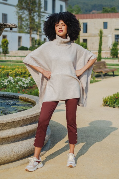 Poncho-style knitted jumper